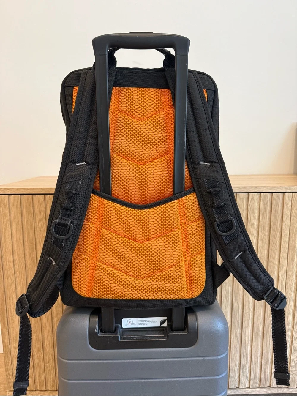 Tumi Black and Orange Men's Backpack with Detachable Travel Pouch